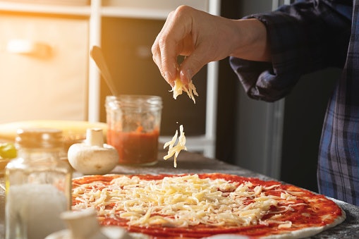 Mozzarella, Cheddar, and Parmesan Are Common Choices